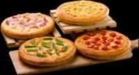 Buy 4 Personal Pan Pizzas at Rs. 499
